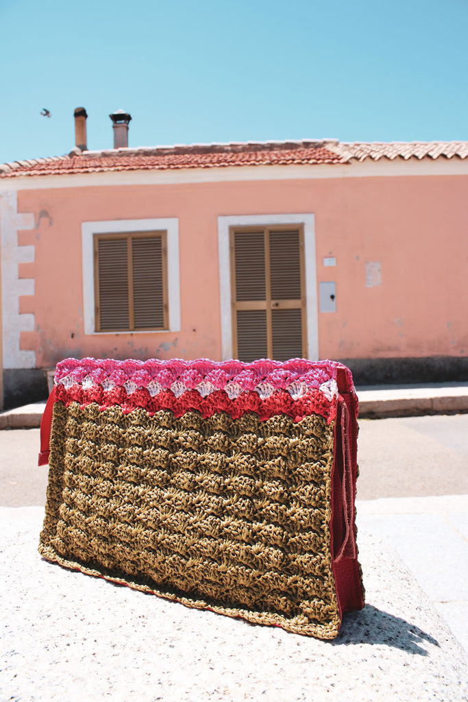Vernazza women's leather and crochet clutch